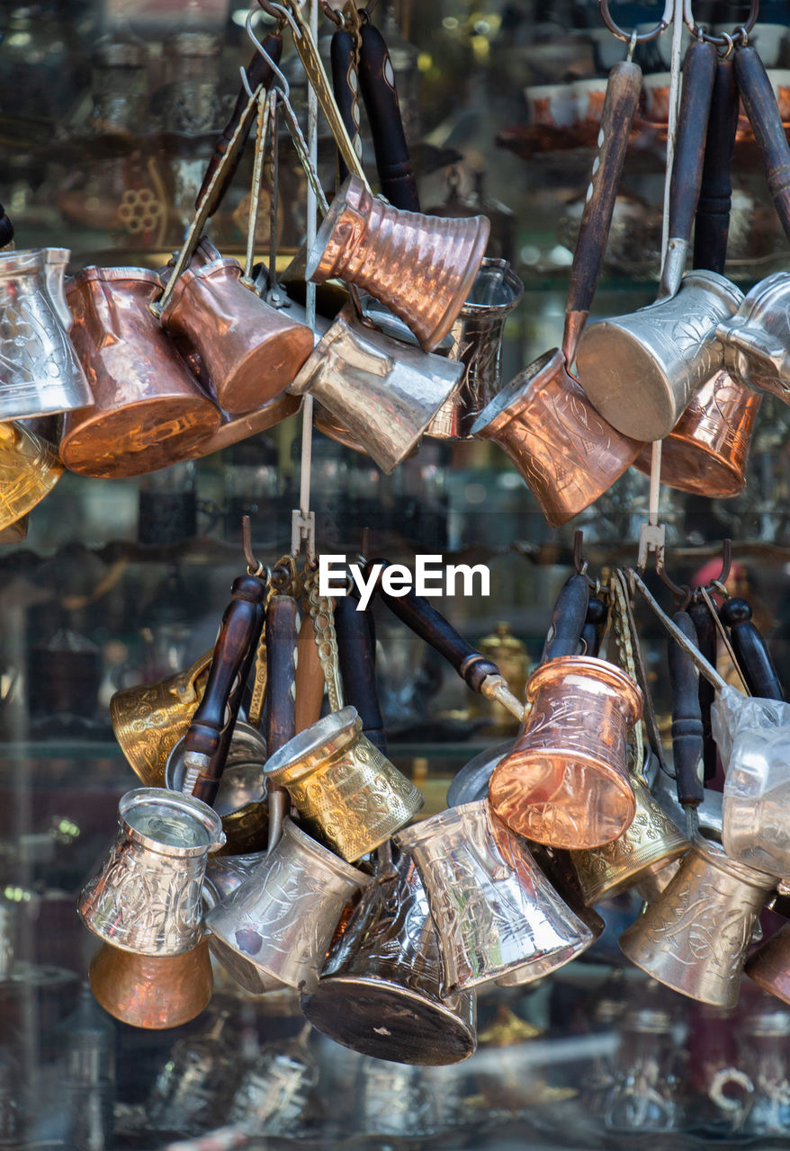 CLOSE-UP OF OLD RUSTY HANGING