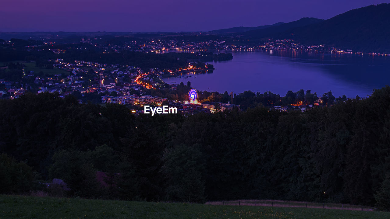 High angle view of illuminated buildings at night