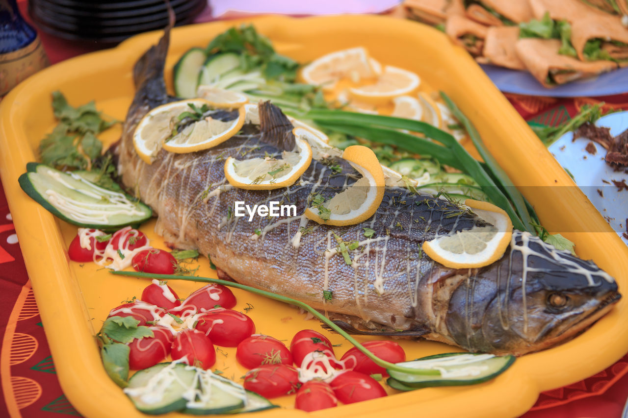 Close-up of fish served on table