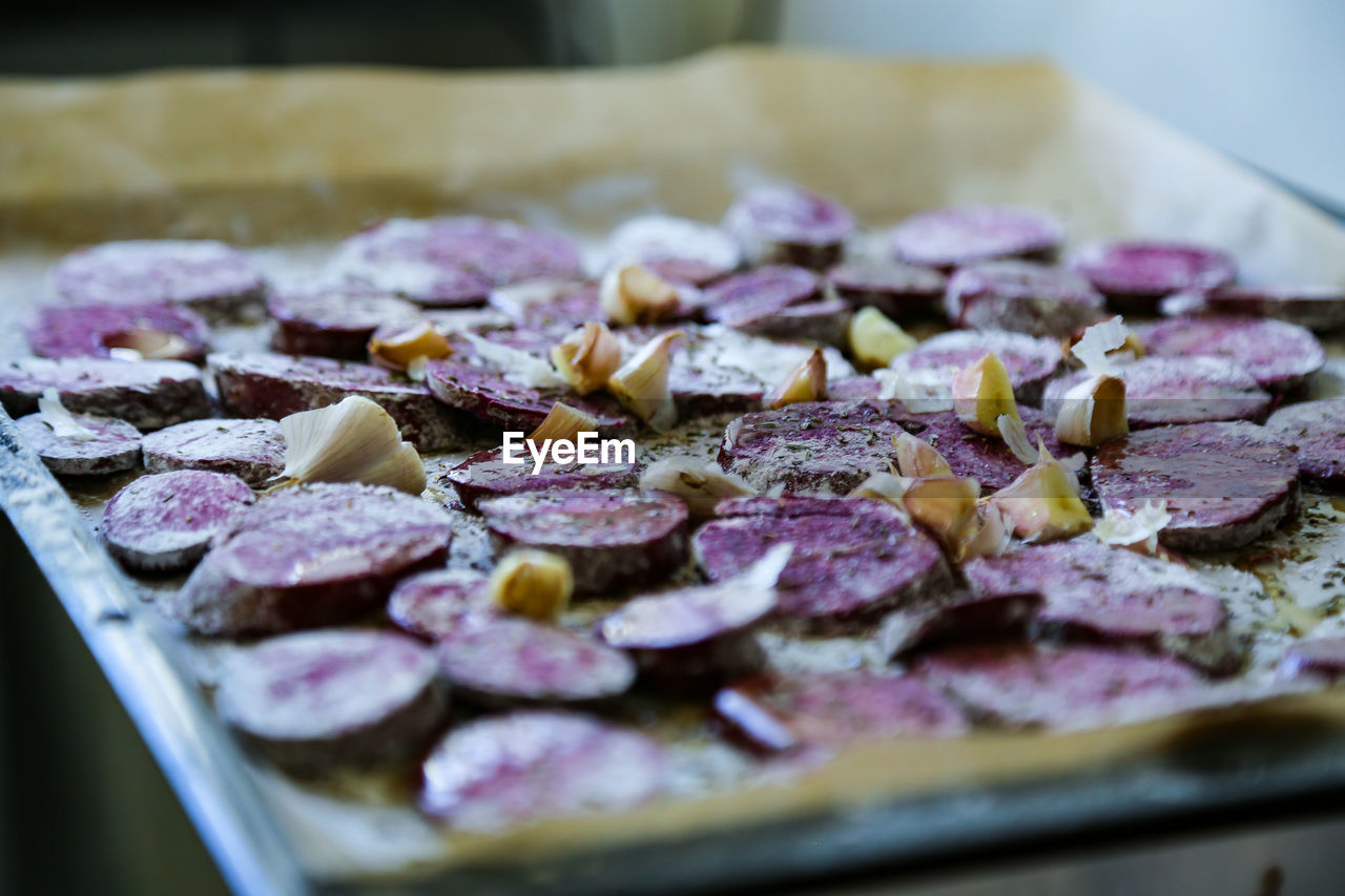 Close-up of chopped sweet potato on cutting board 