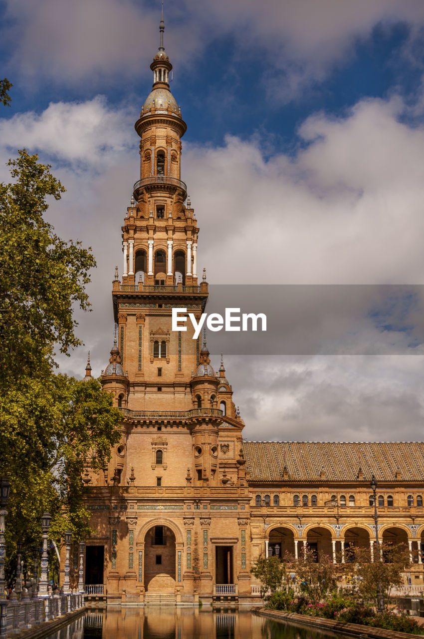 Low angle view of historical building against sky. plazz de espana at sevilla, church