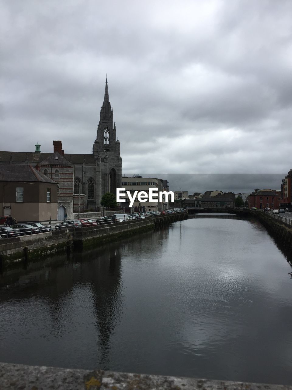 RIVER WITH BUILDINGS IN BACKGROUND