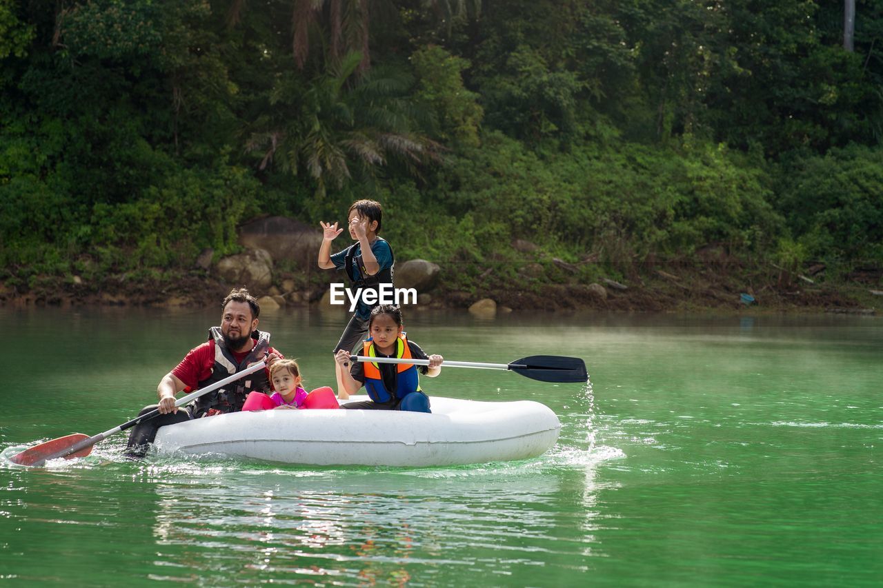 People on boat in water