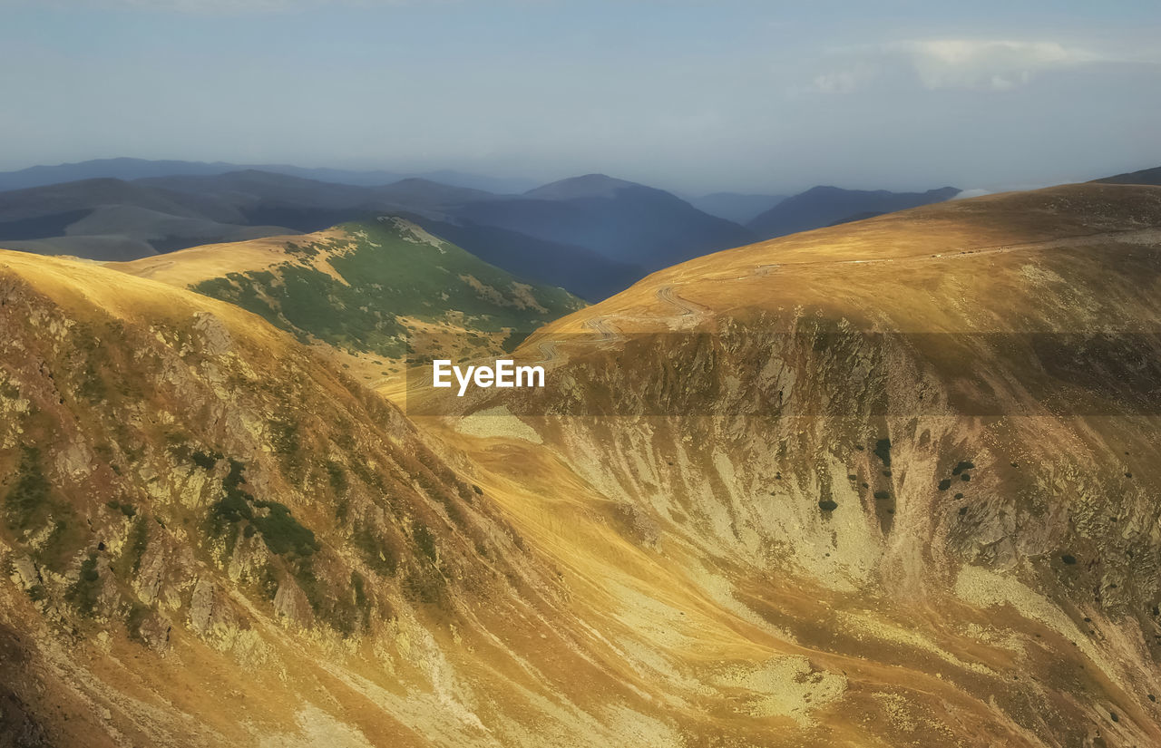 Scenic view of mountains against sky