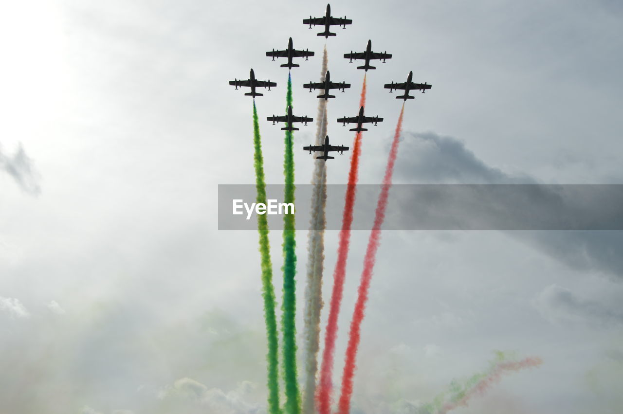 low angle view of airplane flying in sky