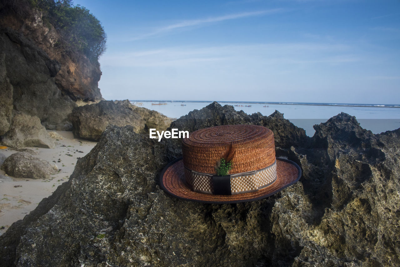 PANORAMIC SHOT OF ROCK ON BEACH AGAINST SKY