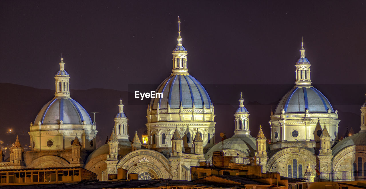 VIEW OF BUILDINGS AT NIGHT