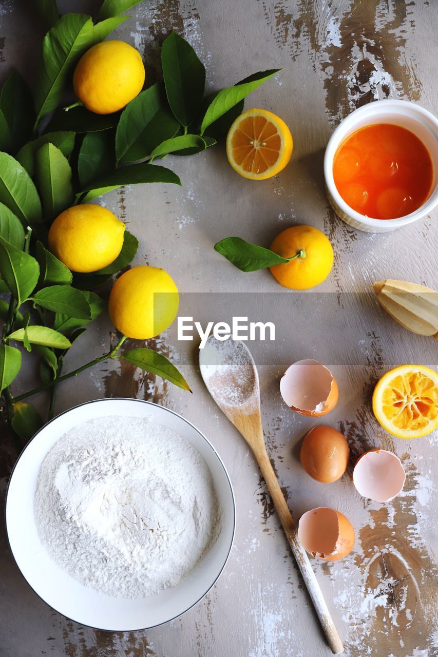 HIGH ANGLE VIEW OF FRUITS IN PLATE ON TABLE