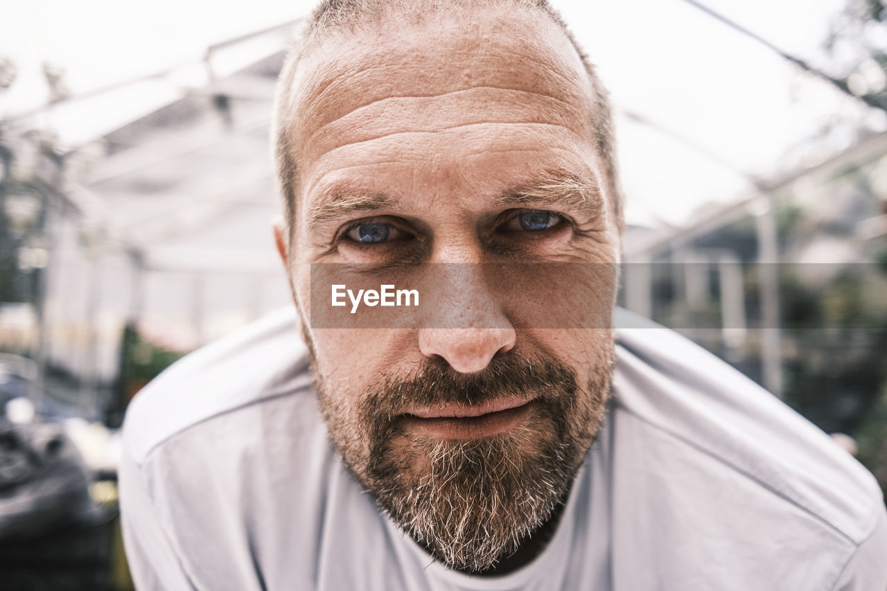 Close-up portrait of man with blue eyes