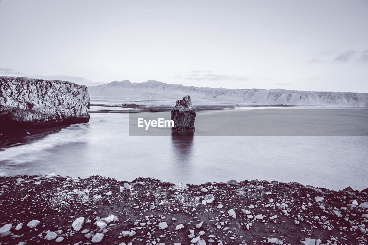 SCENIC VIEW OF LAKE DURING WINTER