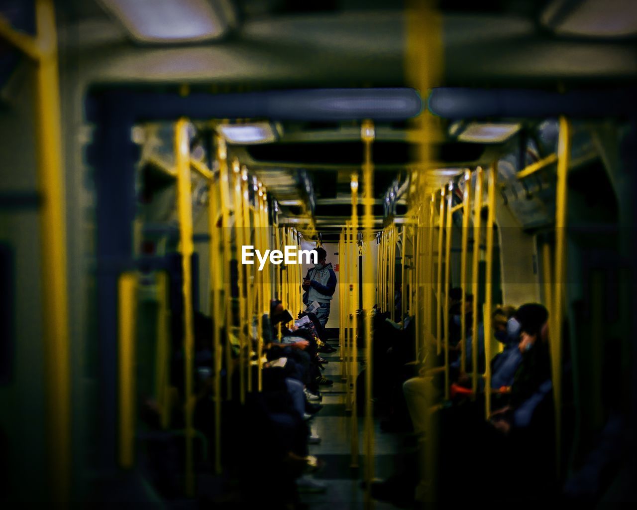 View of people traveling in subway train