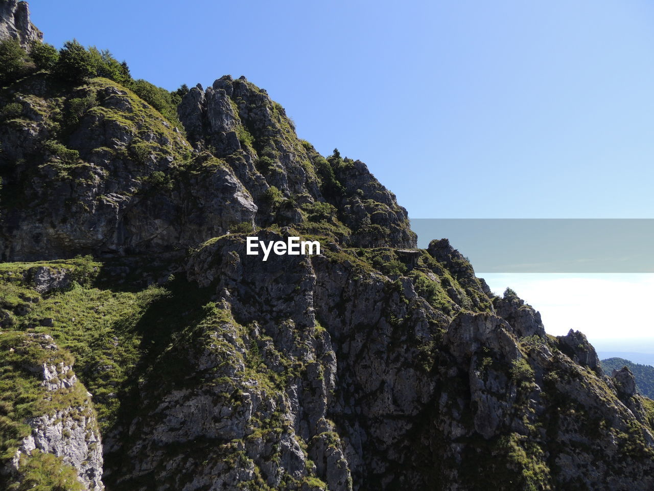 Low angle view of rocks against sky