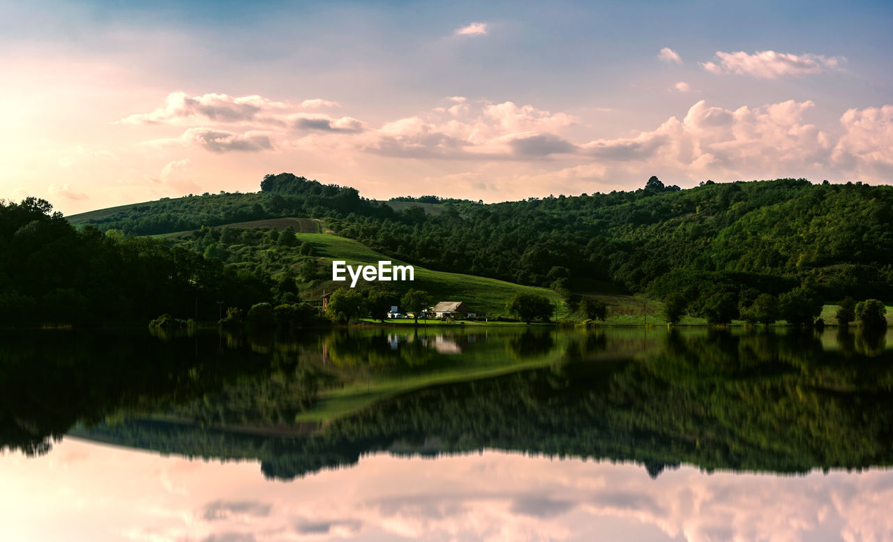 nature, reflection, sky, water, cloud, environment, scenics - nature, landscape, beauty in nature, lake, tree, morning, tranquility, plant, land, tranquil scene, no people, mountain, forest, travel, reservoir, travel destinations, outdoors, green, sun, dusk, idyllic, sunlight, rural scene, sunrise, non-urban scene, twilight, tourism, architecture, summer, building, trip, vacation, social issues, dramatic sky, grass, holiday