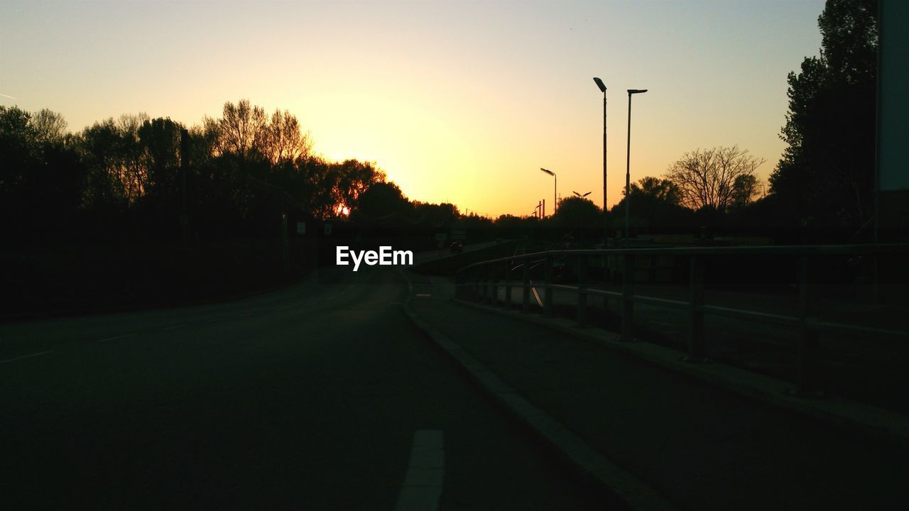 VIEW OF ROAD AT SUNSET