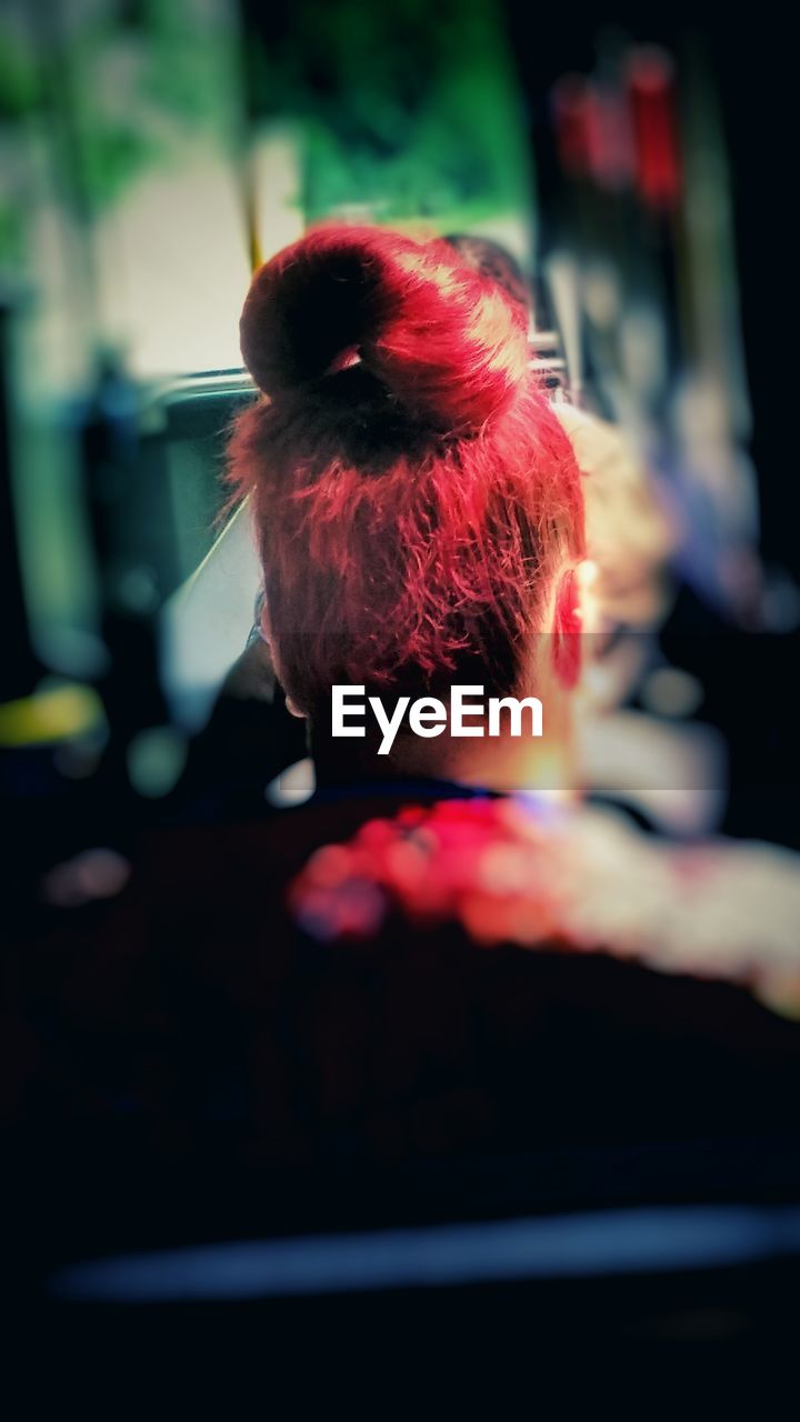 CLOSE-UP OF YOUNG WOMAN