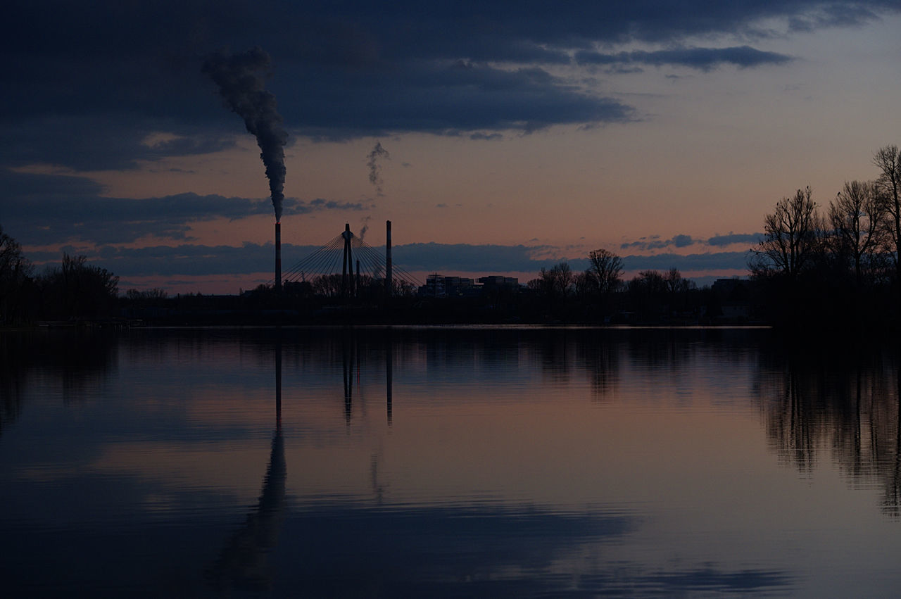 SCENIC VIEW OF LAKE AT SUNSET