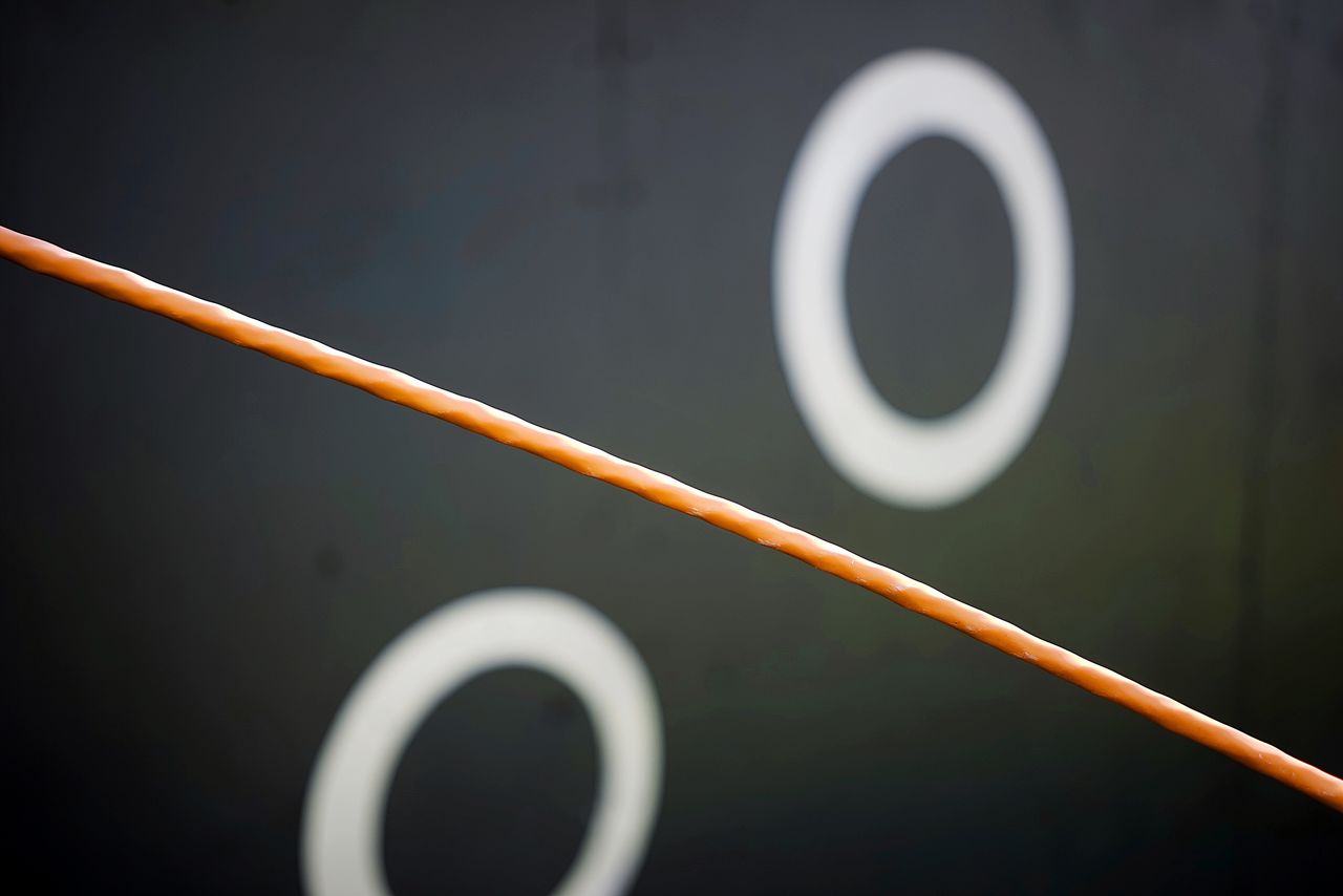 CLOSE-UP OF A SIGN ON METAL