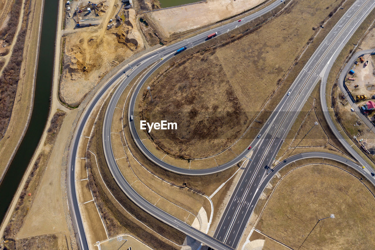 Aerial view of highway on land