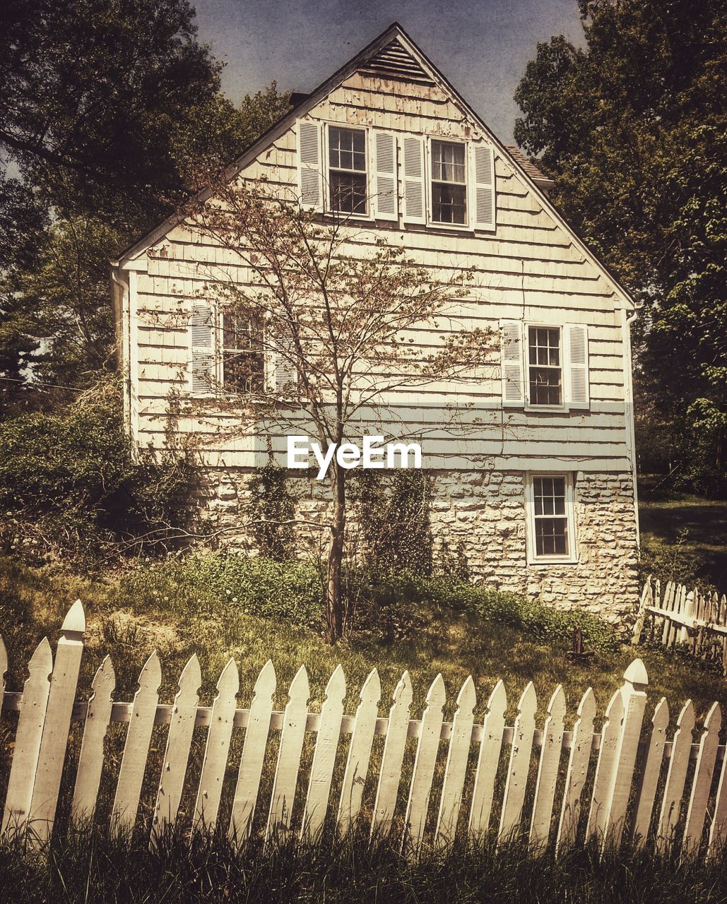 Beautiful rustic scenery with picket fence