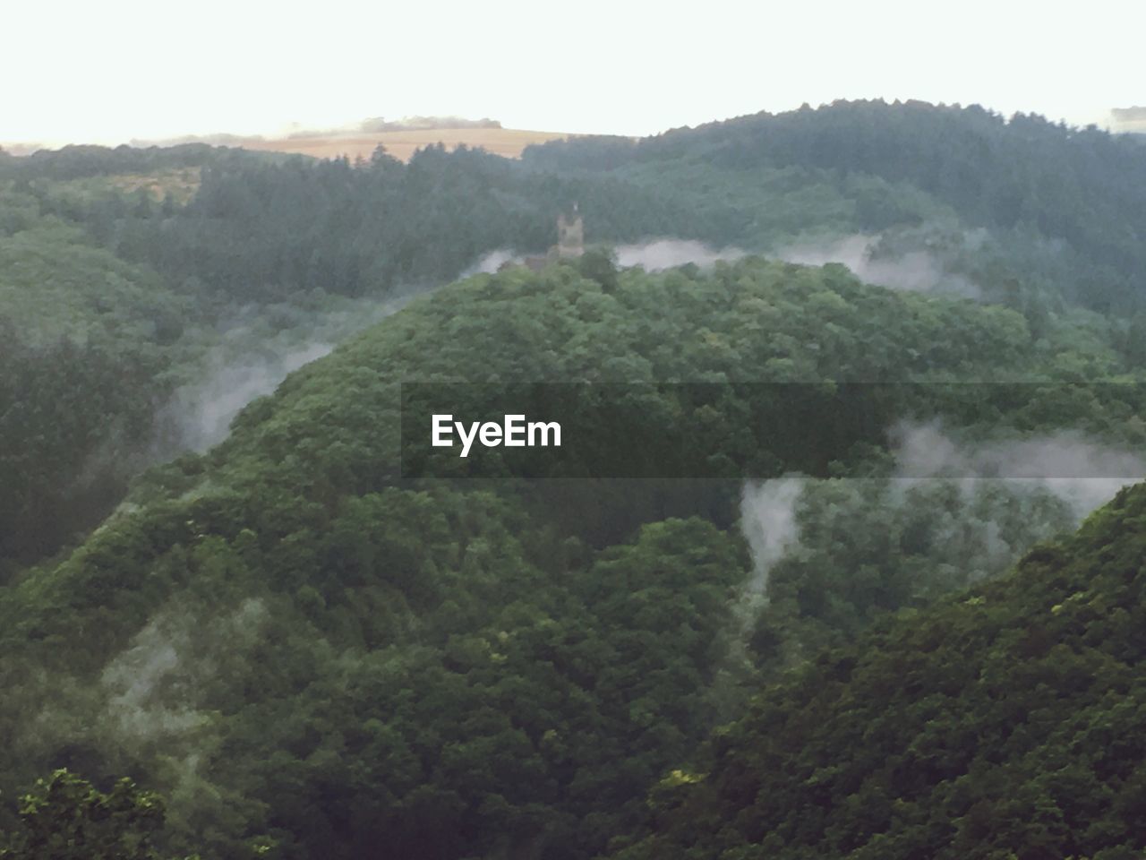 HIGH ANGLE VIEW OF MOUNTAINS AGAINST SKY