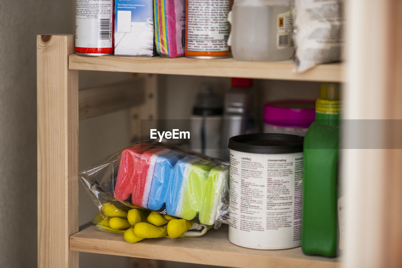 House cleaning supplies on shelf