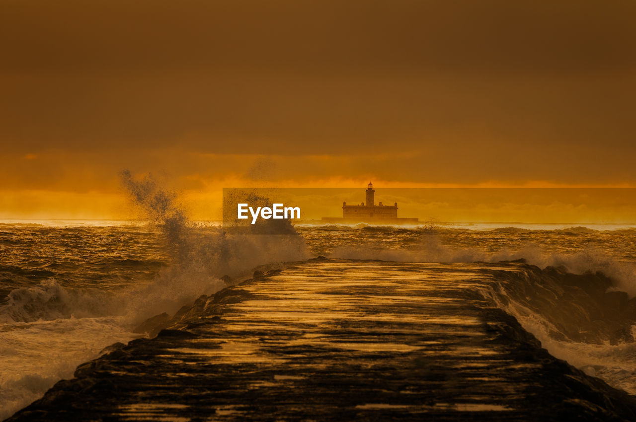 Scenic view of sea during sunset