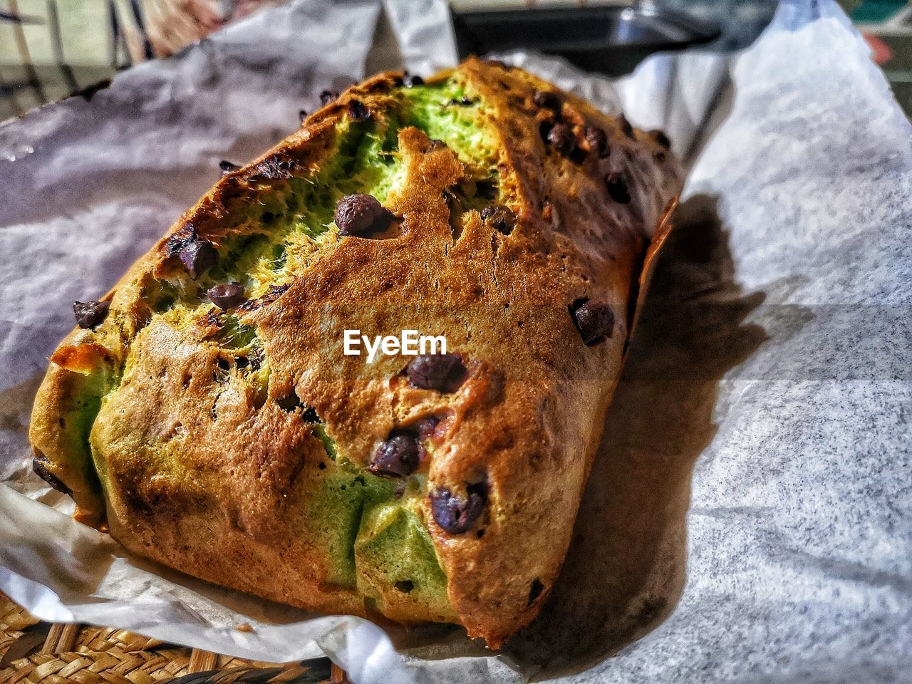 food, food and drink, freshness, still life, ready-to-eat, close-up, no people, indoors, indulgence, unhealthy eating, focus on foreground, high angle view, brown, paper, day, baked, foil, bread, table, temptation