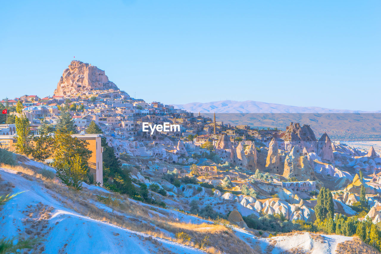 Scenic view of mountain against clear blue sky