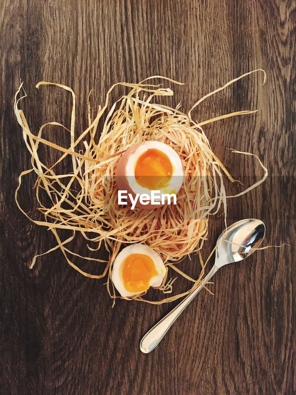 Close-up of egg in nest on table