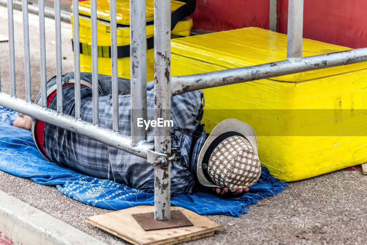 Street vendor sleeping on the street after carnival night in the city of salvador in bahia.