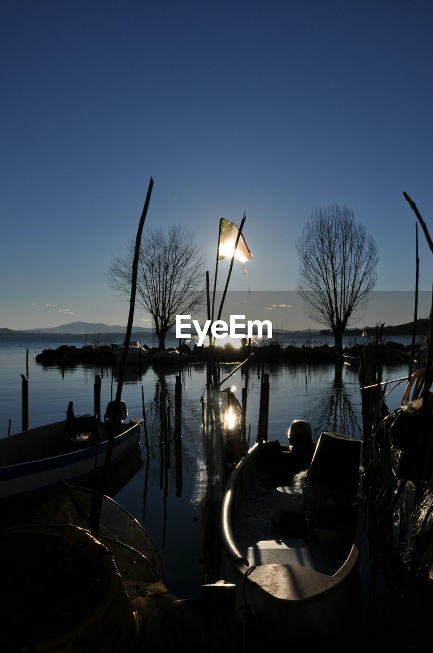 SAILBOATS ON SEA AGAINST CLEAR SKY