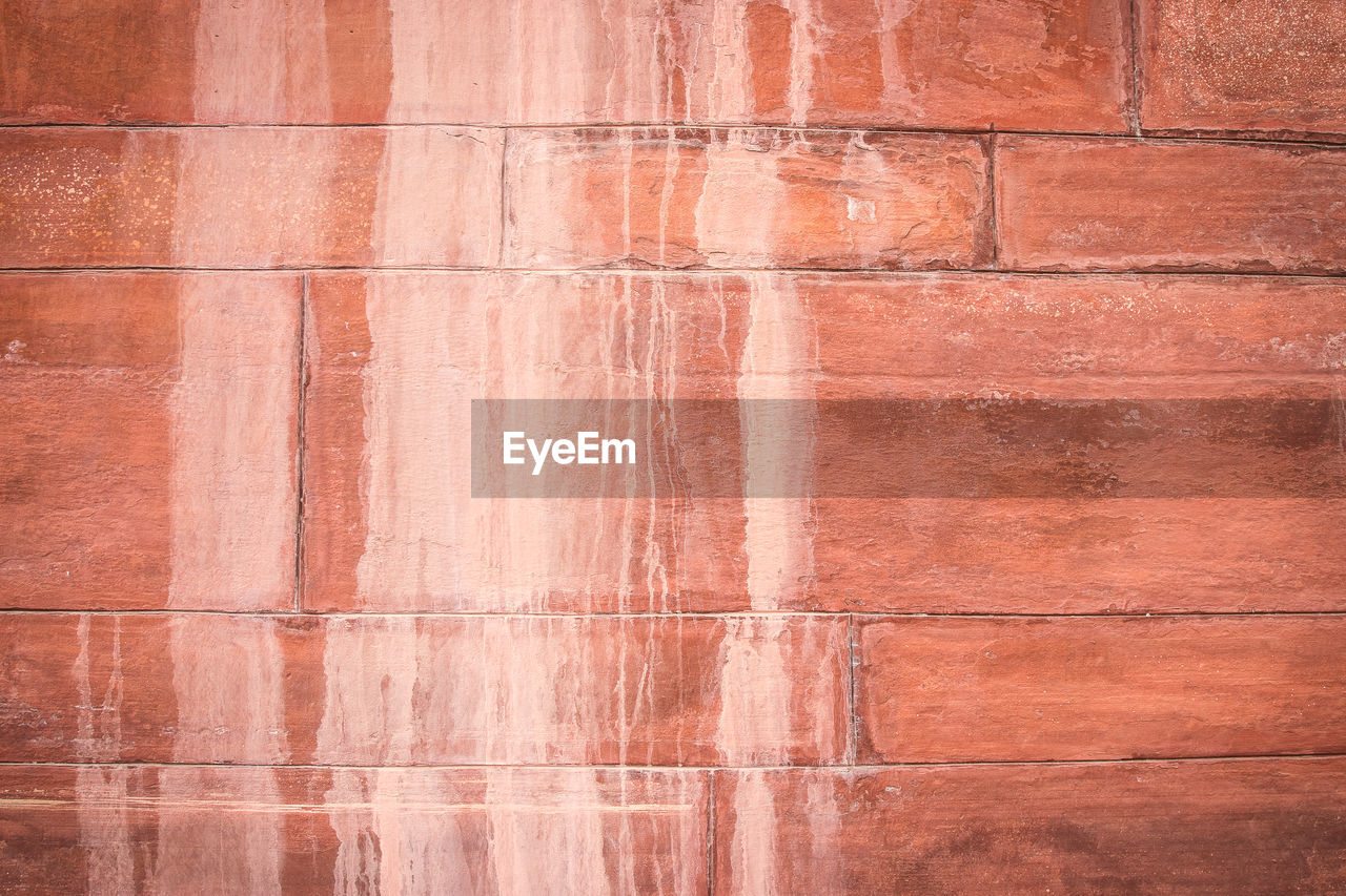 Red cinder block wall background and texture.