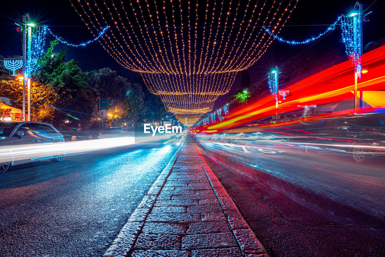 Light trails on road at night