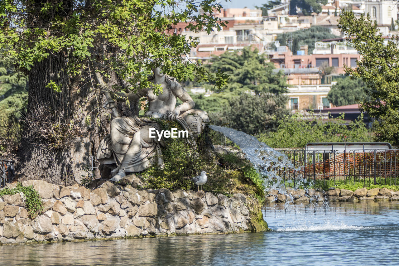 Villa borghese pond with reflections on the water