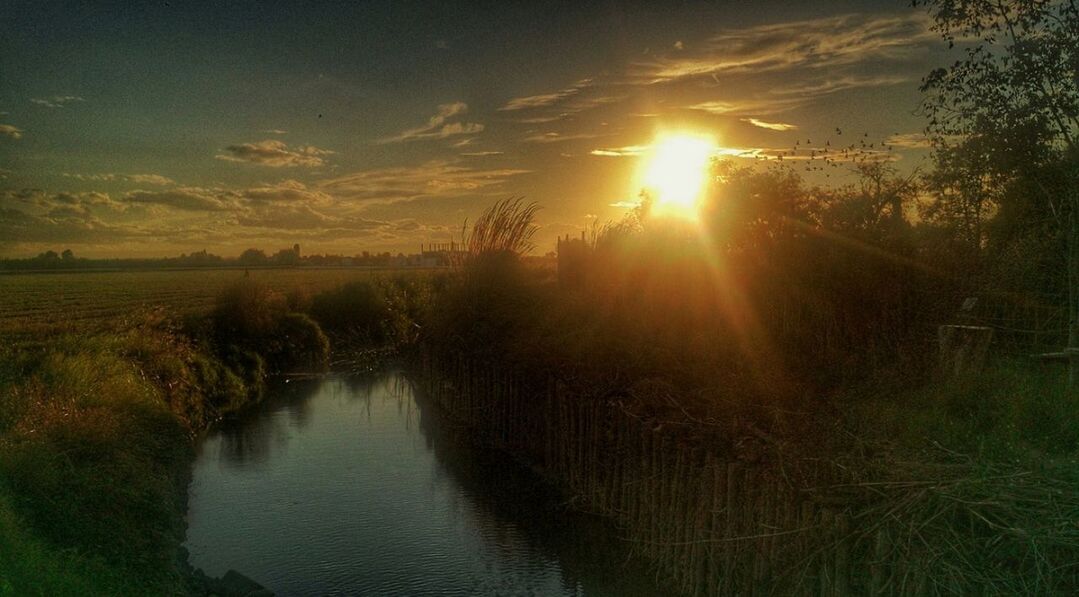 SUNSET OVER LAKE