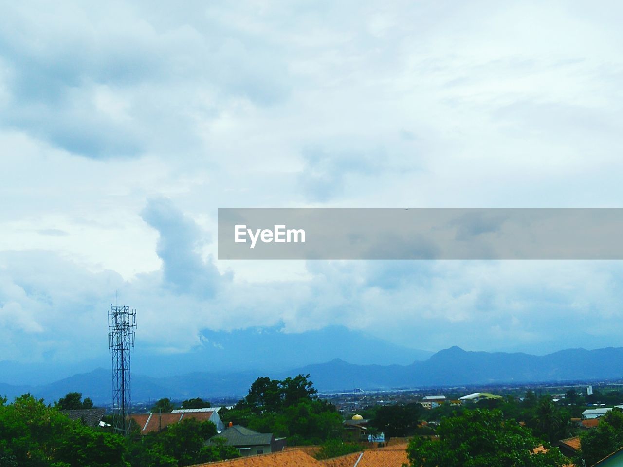 STORM CLOUDS OVER MOUNTAINS