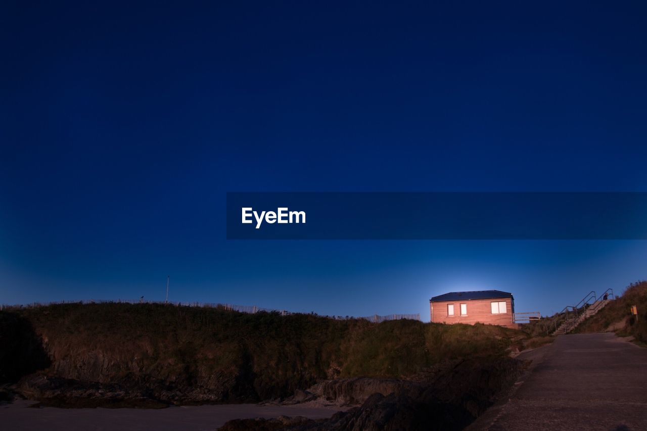 House illuminated at night