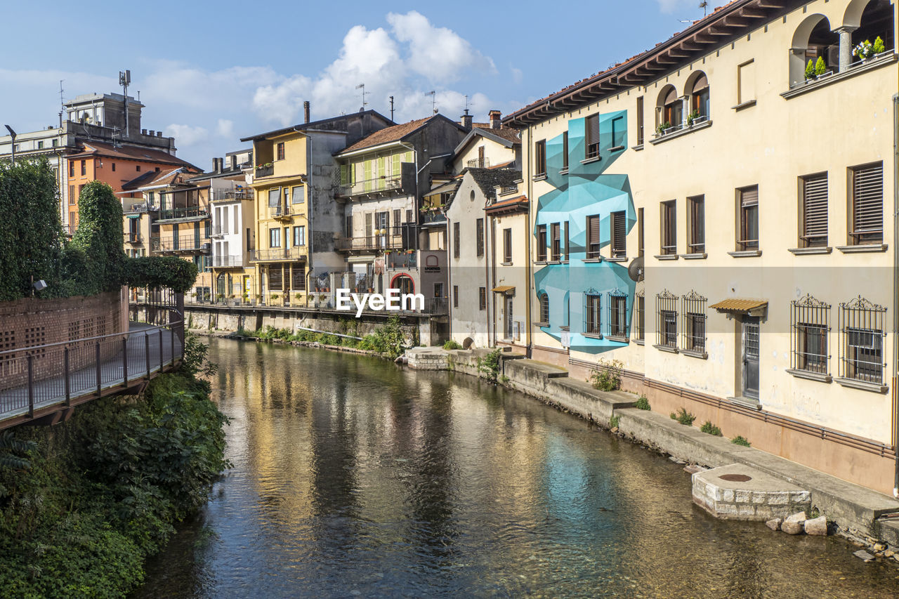 The historic center of omegna with beautiful buildings near the river