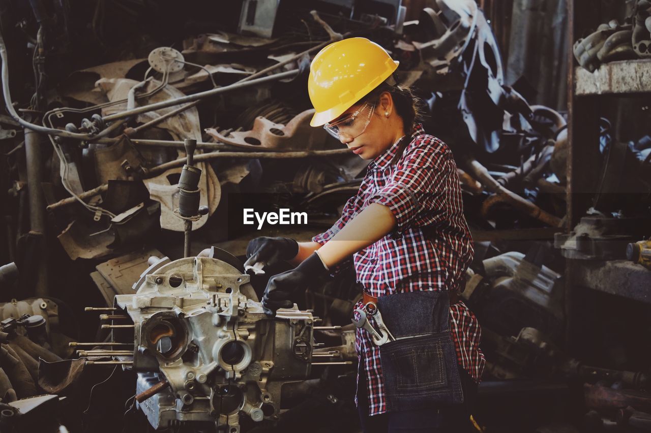 Woman working in machine