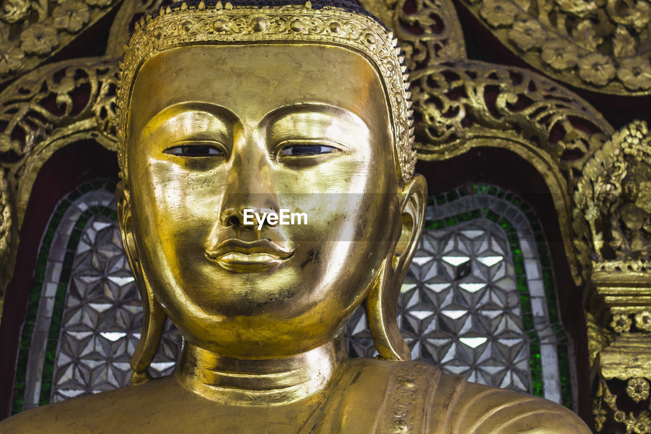 Low angle view of buddha statue