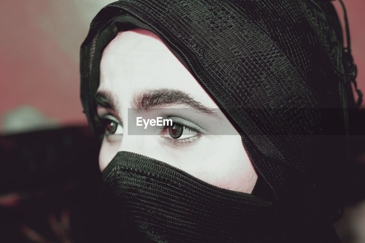 Close-up of young woman wearing hijab