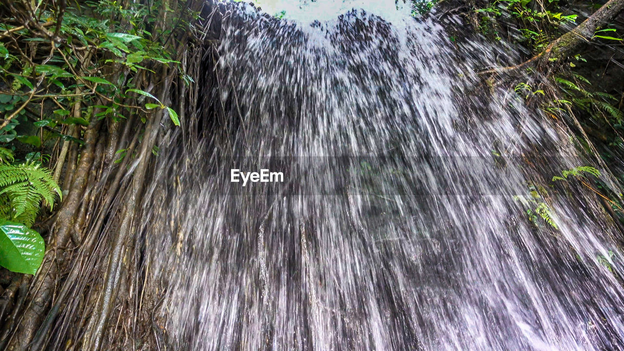 Low angle view of waterfall