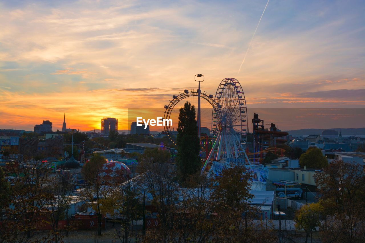 Cityscape against sky during sunset