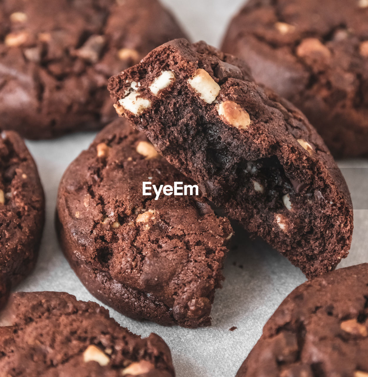 Close-up of chocolate chip cookies on grey table