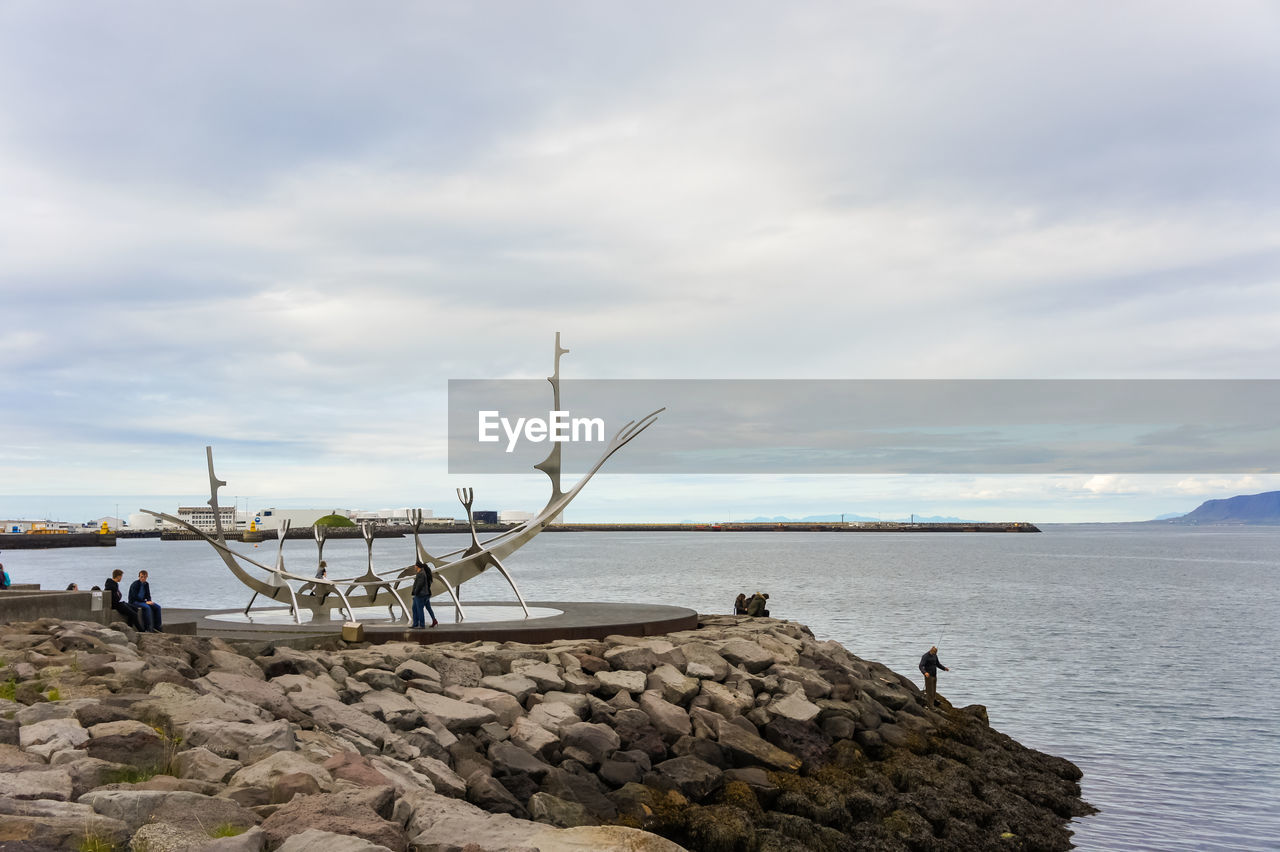 SCENIC VIEW OF GROYNE AGAINST SKY