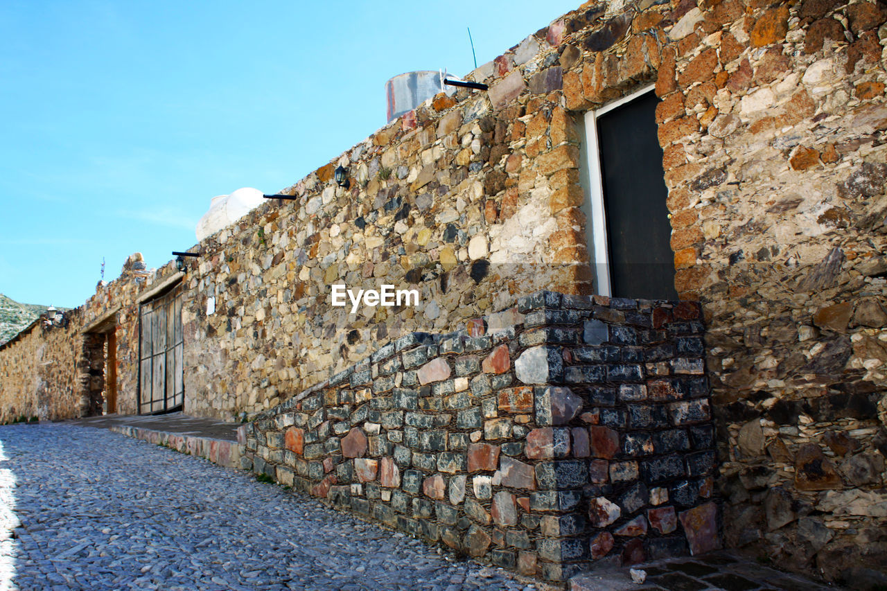 STONE WALL OF OLD BUILDING