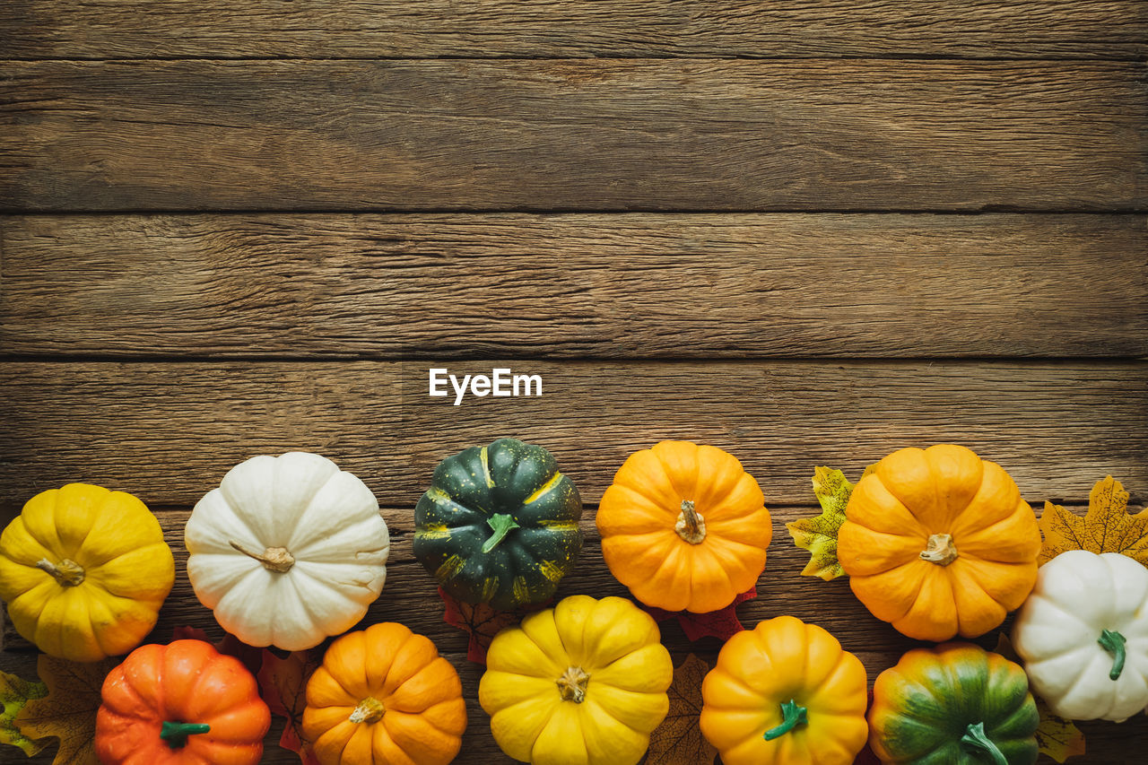 High angle view of pumpkins on table during autumn