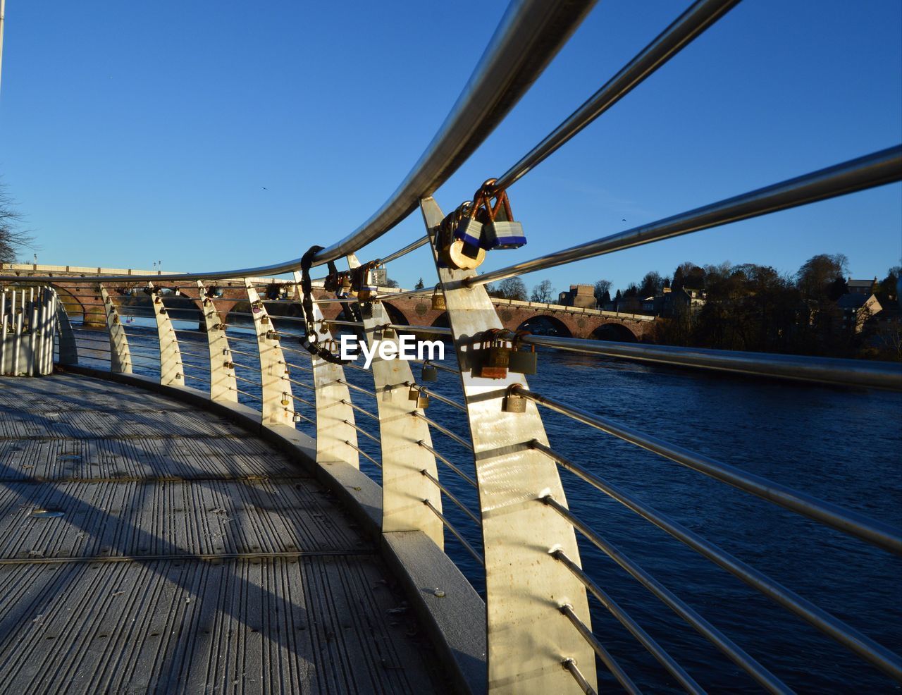 SAILBOAT ON BRIDGE AGAINST CLEAR SKY