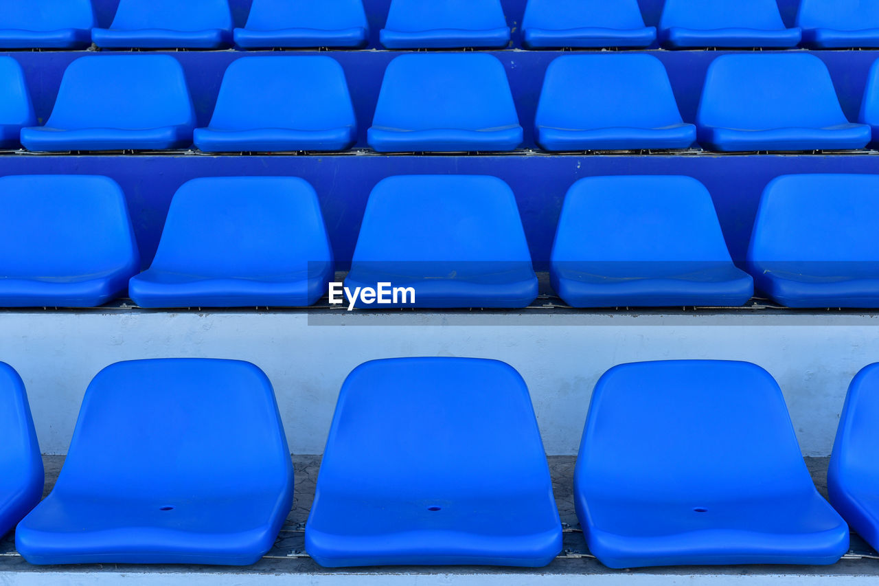 FULL FRAME SHOT OF EMPTY SEATS IN STADIUM