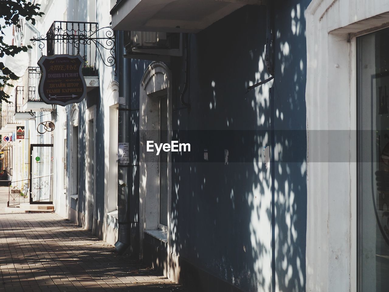 Alley amidst buildings in city